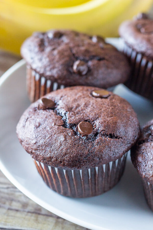 Double Chocolate Banana Muffins. These super moist banana chocolate muffins have big banana bread flavor with a double dose of chocolate. One bowl and super easy! www.justsotasty.com 