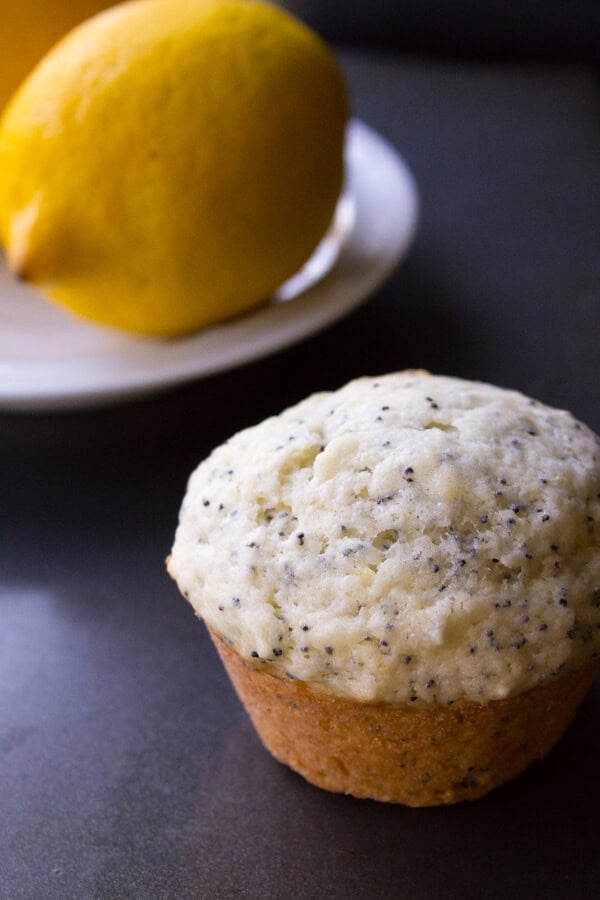 Lemon Poppy Seed Muffins. Super moist, fluffy, buttery & with that perfect lemon flavor - this simple muffin recipe is perfect for summer! www.justsotasty.com