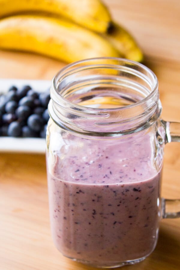 Blueberry Banana Smoothie. Thick & creamy, tastes delicious & totally healthy - have this smoothie for an on-the-go breakfast or healthy snack! www.justsotasty.com