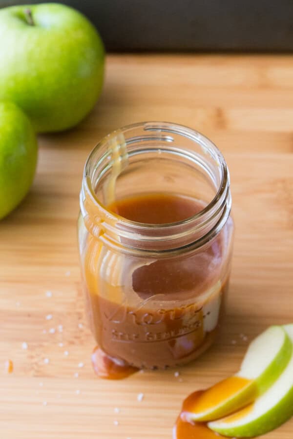 Easy Salted Caramel Sauce. Perfect with pretzels, apple slices, or dizzled on pancakes, cakes or ice cream - making this delicious caramel sauce only takes minutes.