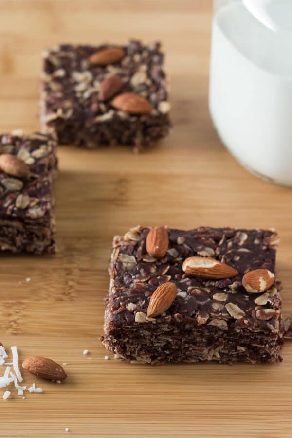 Almonds, coconut & chocolate come together in these delicious Almond Joy Granola Bars. Wholesome ingredients, gluten-free, vegan, super easy and totally addictive! www.justsotasty.com