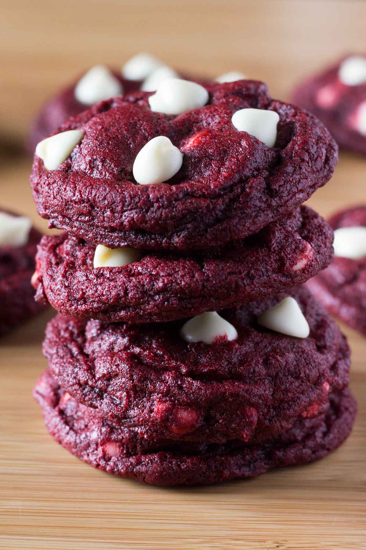 Soft, chewy Red Velvet Chocolate Chip Cookies. With a delicate hint of cocoa & oozing with melted chocolate chips - they're perfectly festive!