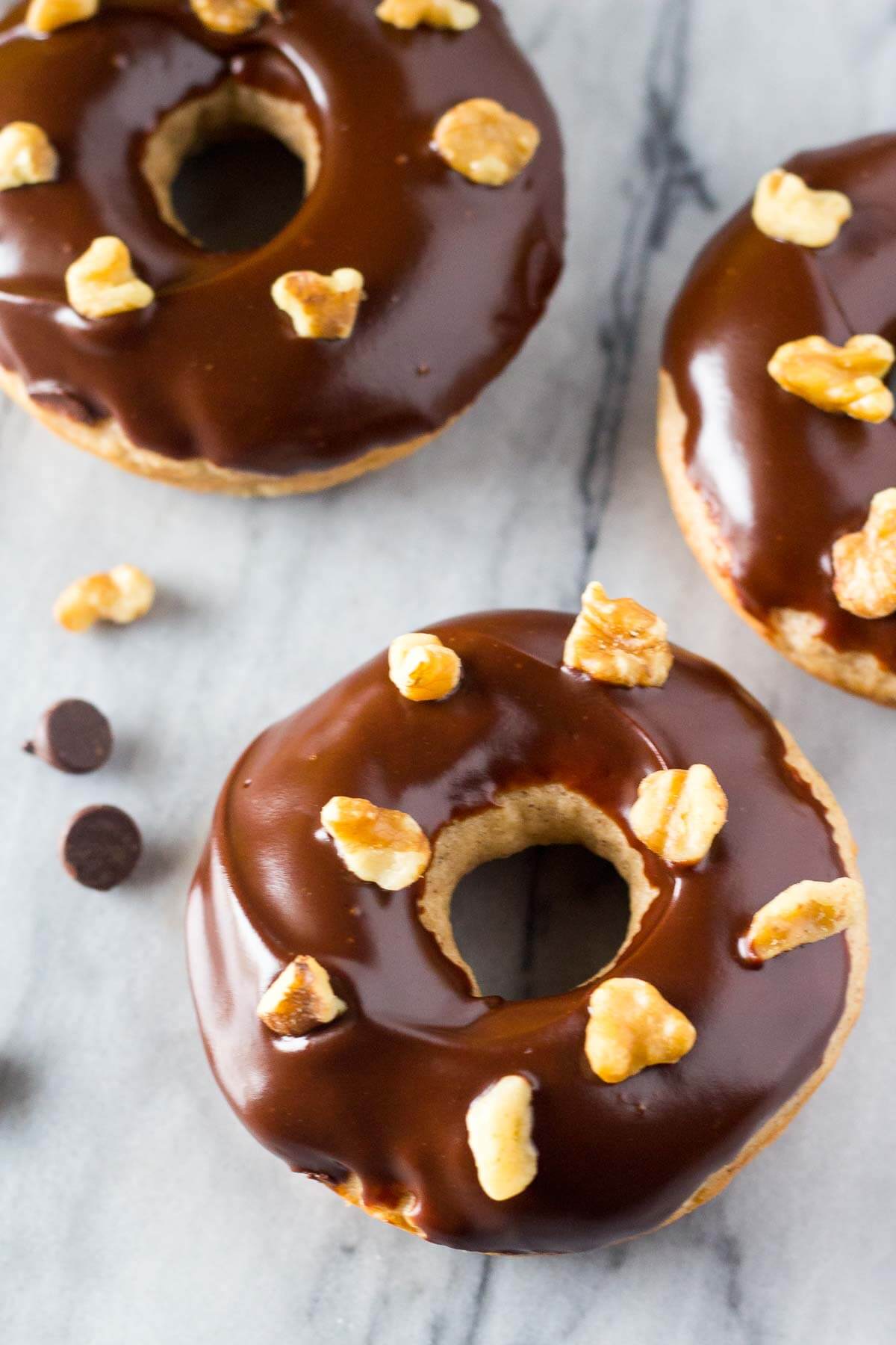 Banana Doughnuts with Chocolate Glaze - Baked not fried with big banana bread flavor & so perfect for breakfast!