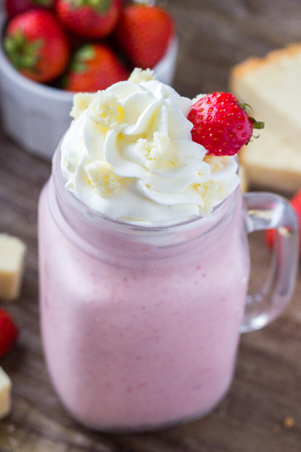Up your milkshake game with this Strawberry Shortcake Milkshake! Thick & creamy, with fresh strawberries & delicious vanilla cake - it's the perfect summer treat!