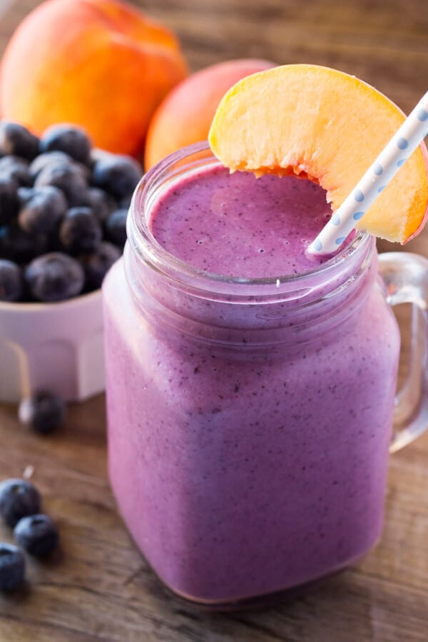 This blueberry peach smoothie with almond milk is dairy free, naturally sweetened & so delicious from the fresh summer fruit. 4 ingredients & perfectly refreshing!