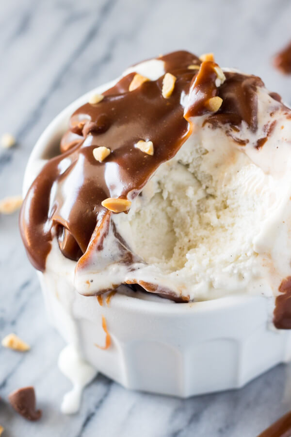 Silky smooth Chocolate Peanut Butter Sundae Sauce. 5 ingredients, made in the microwave & ready in less than 5 minutes - this decadent sauce is like a peanut butter cup in sundae form!