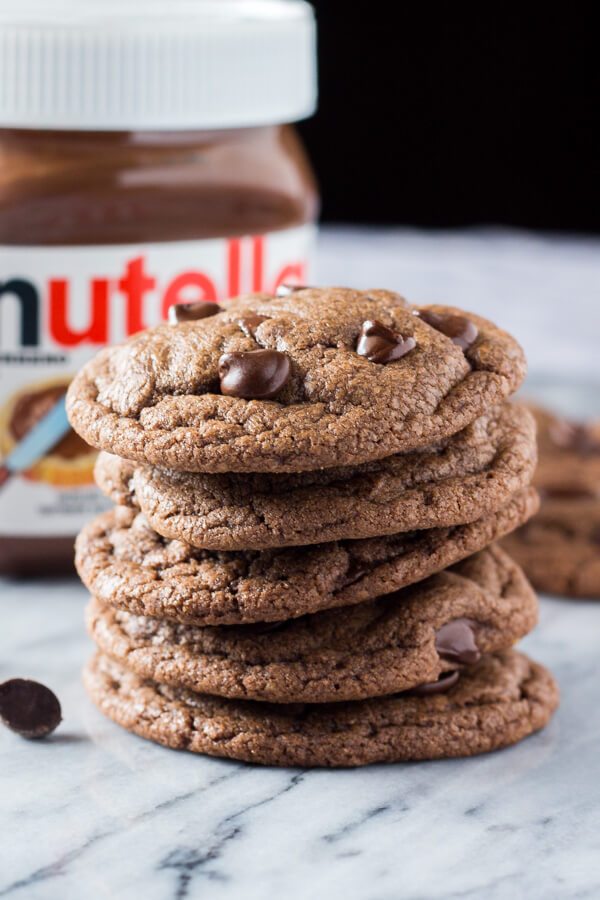 These Nutella Cookies are soft & chewy, super fudgy, & filled with Nutella goodness. Take your chocolate chip cookies up a notch with chocolate hazelnut goodness.