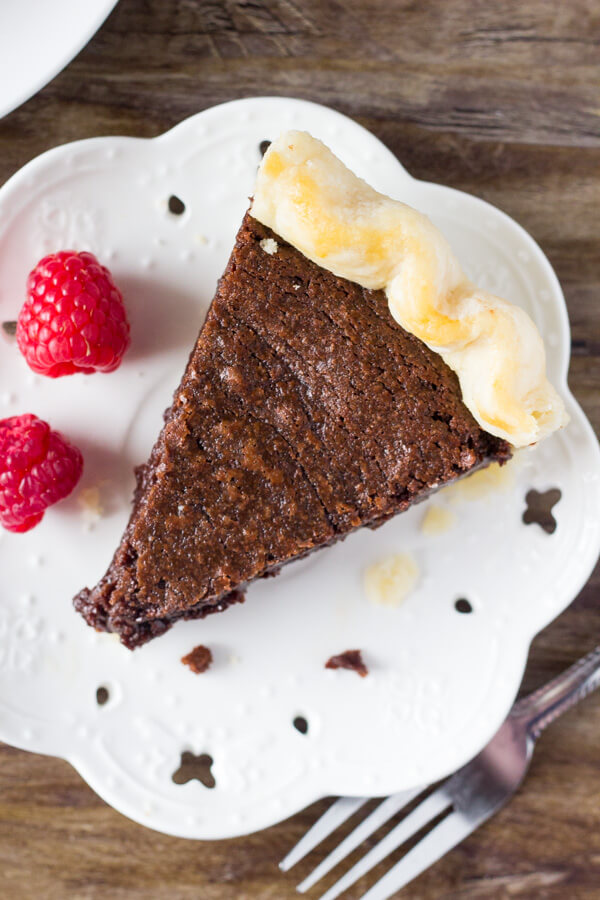 This easy, homemade Fudge Brownie Pie features a flaky, golden pie crust shell filled with the gooiest, fudgiest brownie. Serve it with ice cream & caramel sauce for the ultimate treat!