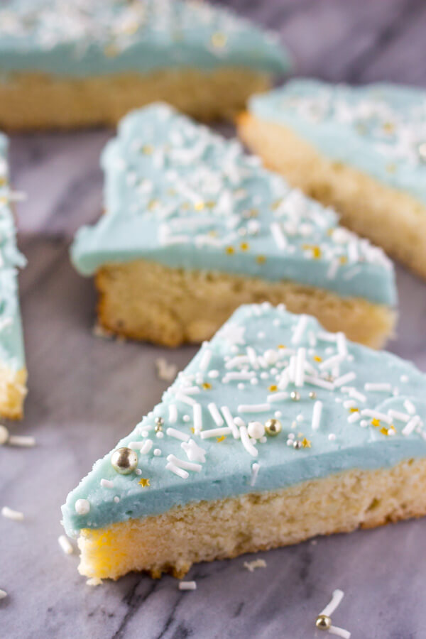 Frosted Sugar Cookie Bars. Super soft and chewy, these Lofthouse style bars melt in your mouth and are so easy to make. www.justsotasty.com