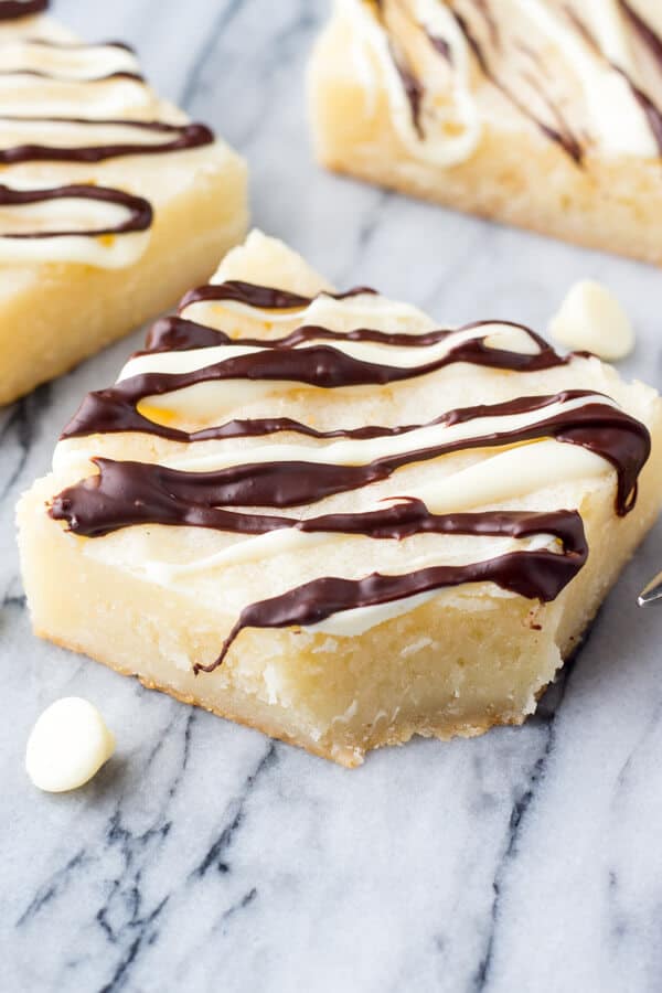 White Chocolate Brownies. These super fudgy, gooey white chocolate brownies are made in one bowl and perfect for white chocolate lovers. www.justsotasty.com