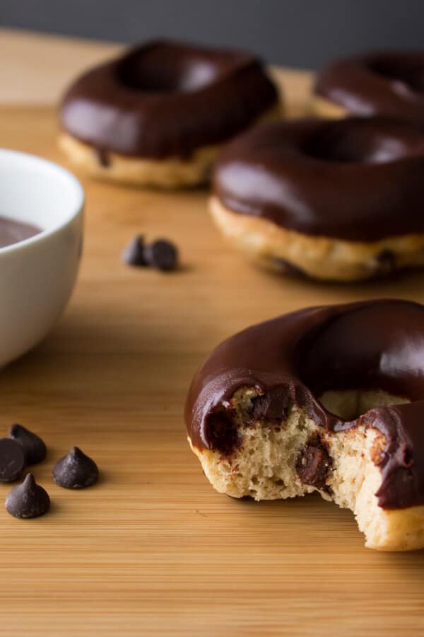 Chocolate Chip Doughnuts. Cake doughnuts baked in a doughnut pan, filled with chocolate chips & dipped in chocolate glaze - Say hello to your new favorite breakfast!