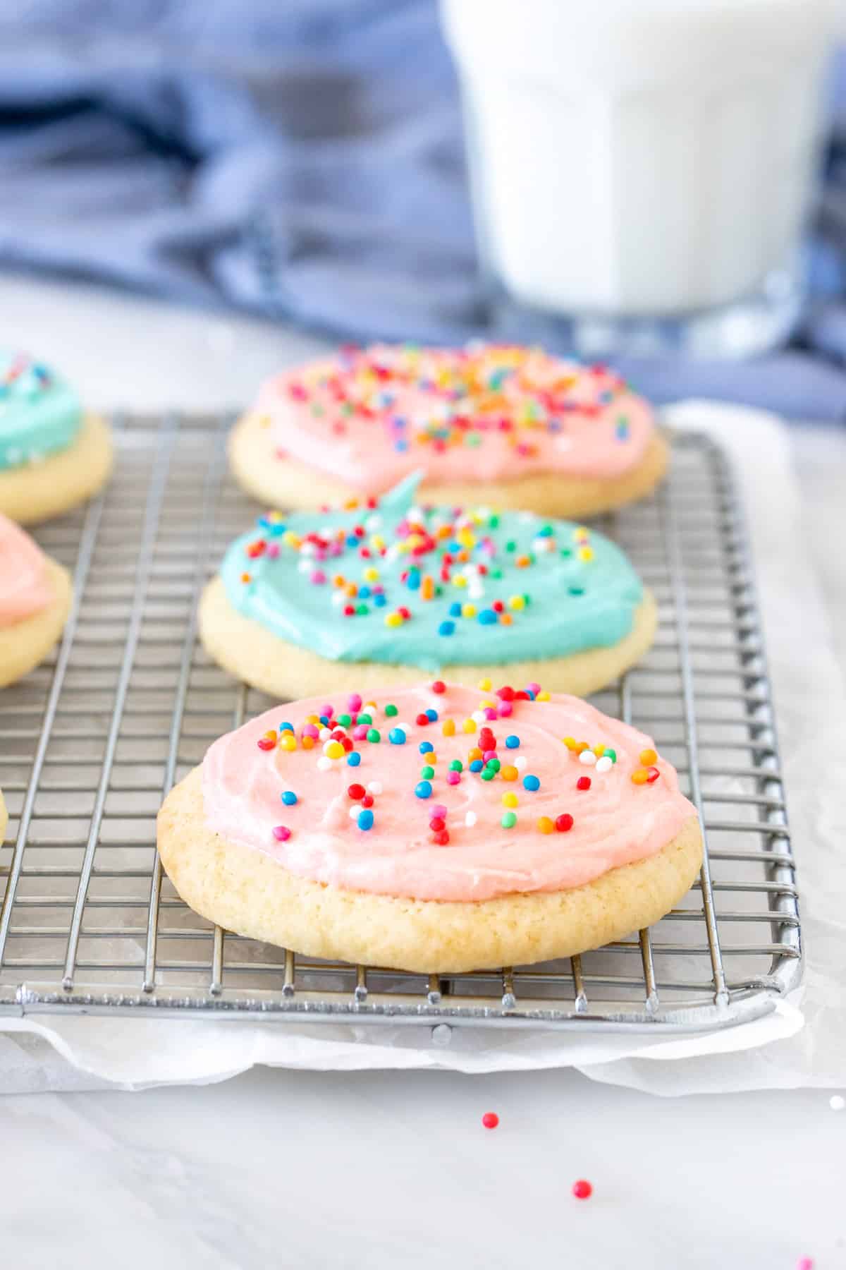 Sour cream sugar cookies on a wire rack