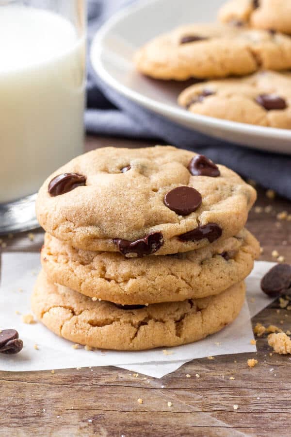A stack of flourless peanut butter cookies - soft, chewy, & filled with chocolate chips. 