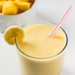 Thick, tropical & full of sunny fruit flavors to brighten even the dreariest of days - Make this Mango Fruit Smoothie for the perfect healthy pick-me up! www.justsotasty.com