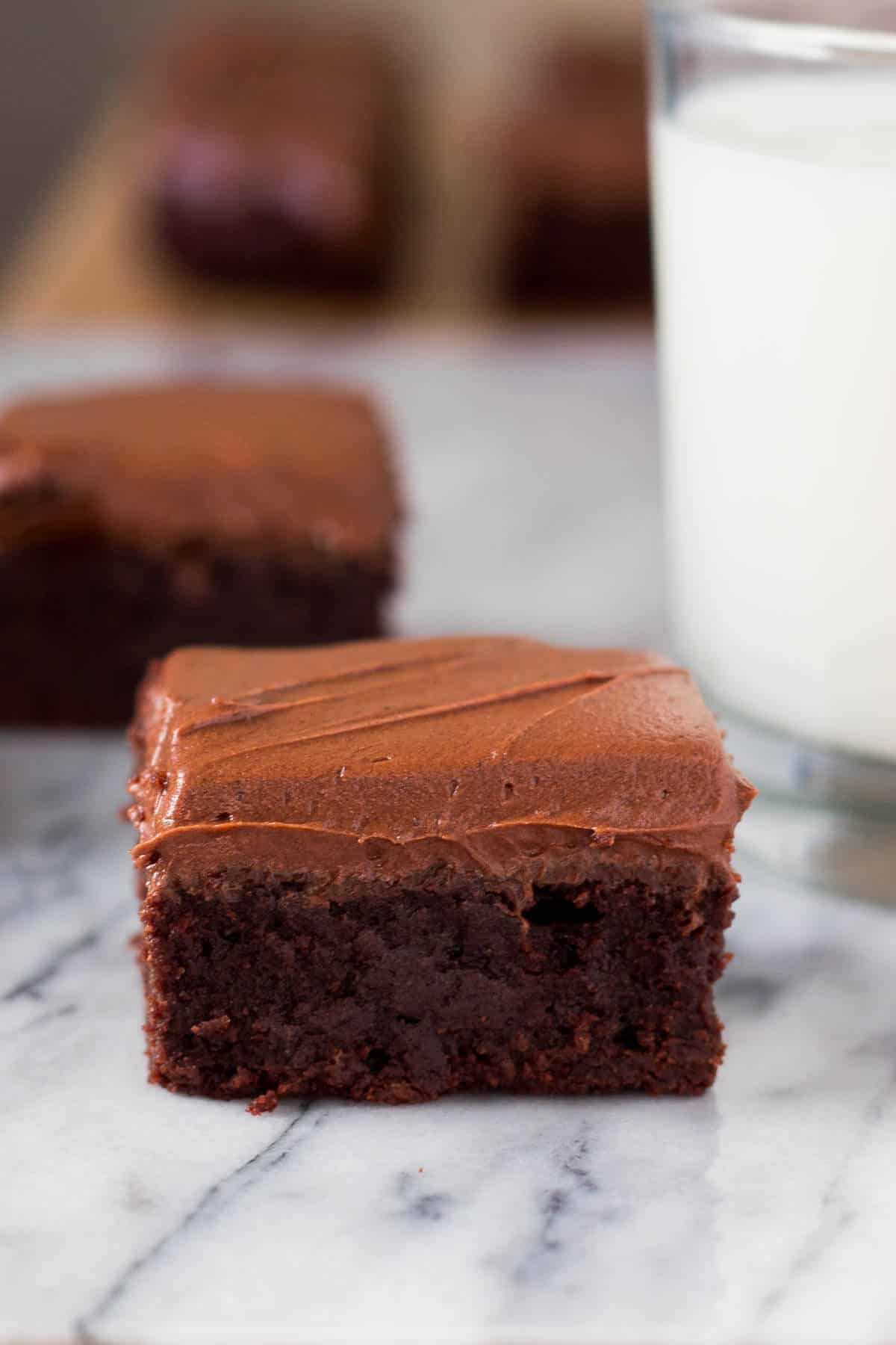 So fudgy, so delicious & slathered with a thick layer of cream cheese chocolate frosting - you NEED to make these brownies!