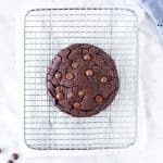 Very large chocolate cookie on a cooling rack