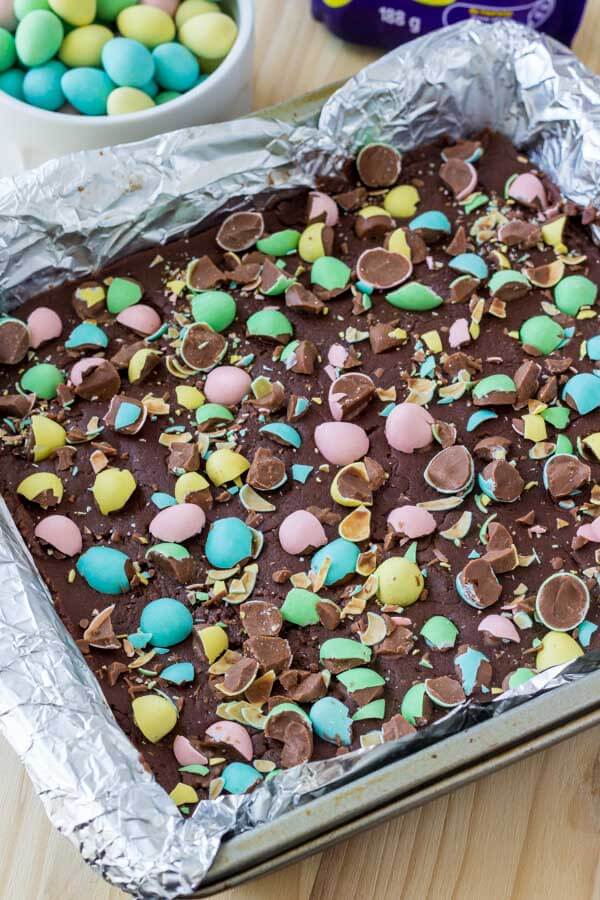 Easter Chocolate Fudge - smooth, creamy & topped with mini eggs. 