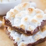 Chewy, gooey, Super Easy S'mores Bars - a blondie-like base, melted milk chocolate & toasted marshmallows come together in these amazing treats! Ready in no time and no mixer required!