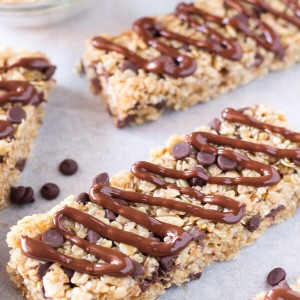 Soft & chewy, no bake Homemade Granola Bars with chocolate chips and chocolate drizzle. This peanut free granola bar recipe is so easy and so perfect for back to school!