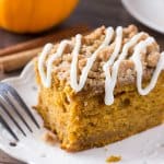 Pumpkin, spice & everything nice come together in this easy Pumpkin Coffee Cake with streusel topping. Made with sour cream so it's super moist - this pumpkin crumb cake is perfect for fall!