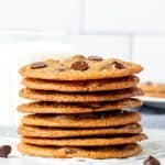Thin chocolate chip cookies, stacked on top of each other