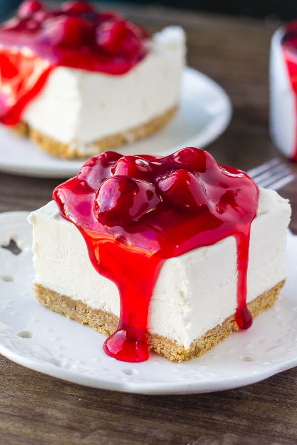 No Bake Cherry Cheesecake Bars. These quick and easy cheesecake bars are deliciously creamy with a crunchy graham cracker crust. Only 15 minutes to make! www.justsotasty.com