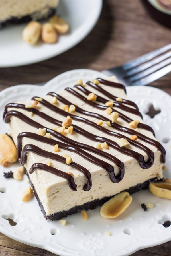 Drumstick cake is an easy, homemade, no bake peanut butter ice cream cake with all the flavor of drumstick ice cream cones. With an Oreo crust, fudge sauce & peanuts - if you love buster bars you definitely need to try this!