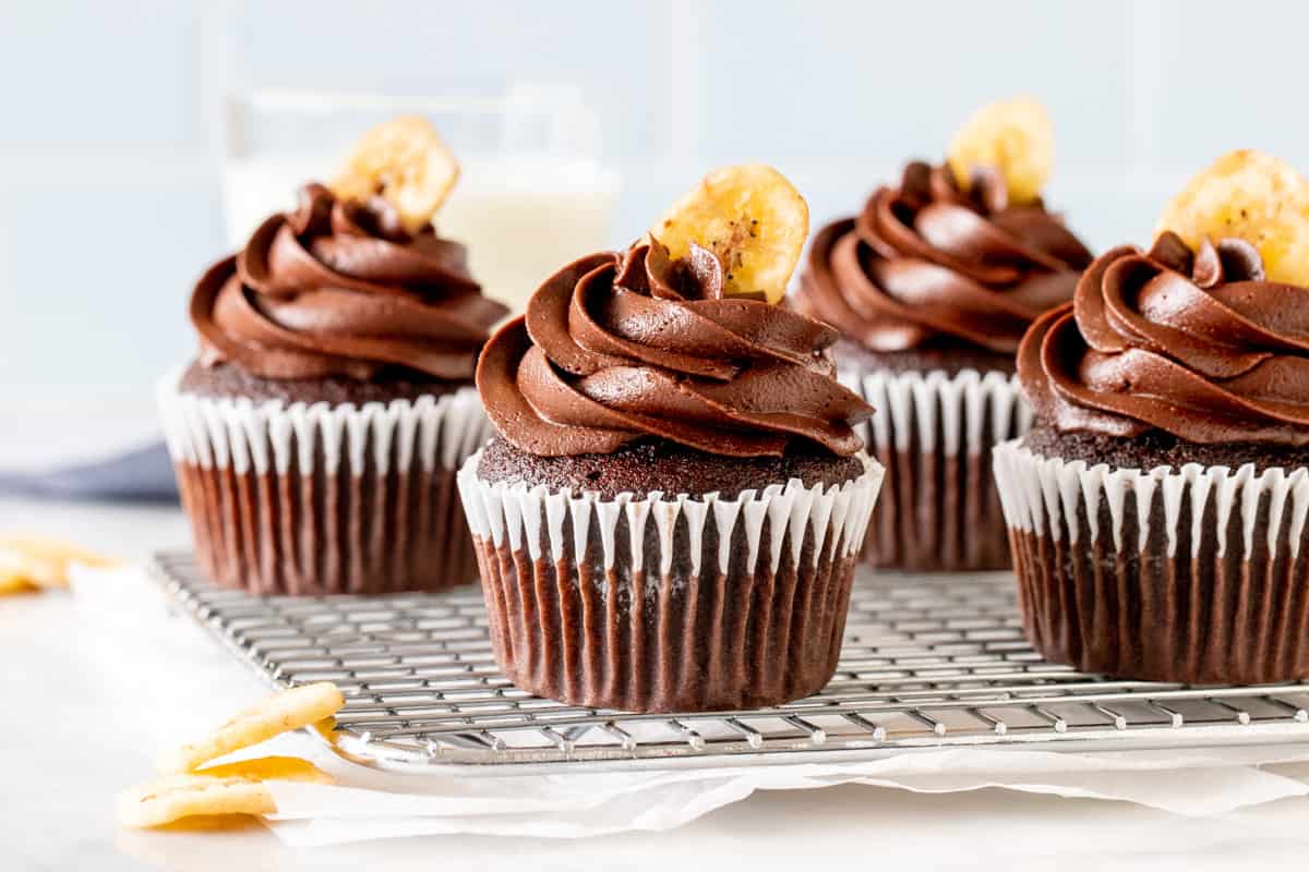Double chocolate banana cupcakes with chocolate buttercream and a banana chip on top