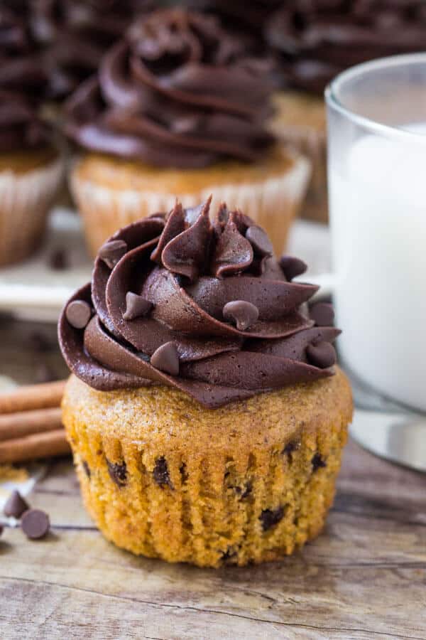 These Pumpkin Chocolate Chip Cupcakes are moist, fluffy and topped with fluffy chocolate frosting. They have all your favorite fall flavors thanks to pumpkin, cinnamon, brown sugar & vanilla - then the mini chocolate chips and chocolate buttercream makes for the perfect combo. 