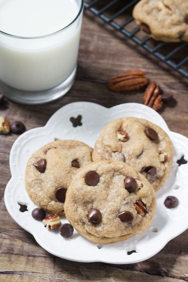 Soft, chewy super flavorful Brown Butter Pecan Chocolate Chip Cookies. The brown butter gives a delicious nutty caramel flavor that makes these cookies so addictive. Then add pecans and lots of chocolate chips - and you've got the perfect recipe! 