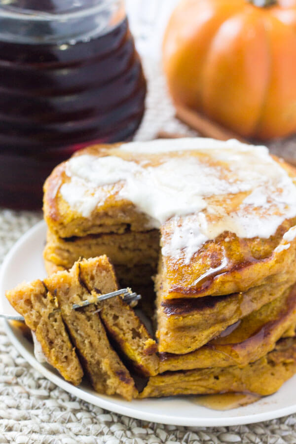 If you're looking for the perfect fall breakfast - look no further. These fluffy pumpkin pancakes are filled with cinnamon, vanilla, a hint of brown sugar, and of course - lots of pumpkin. 