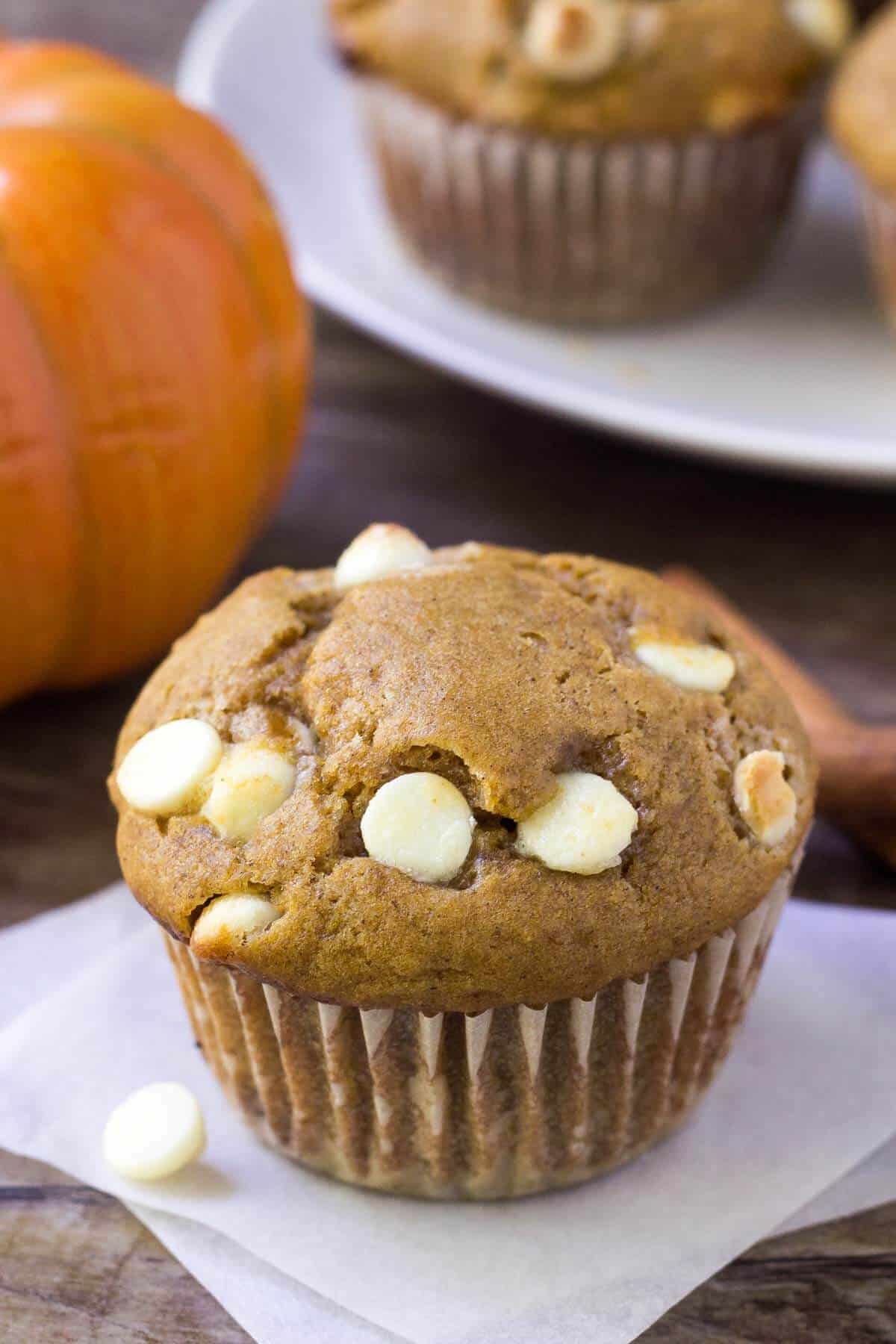 These pumpkin white chocolate chip muffins are fluffy, moist and filled with white chocolate chips. The pumpkin flavor & spices go deliciously with sweet white chocolate for a combo that's completely delicious.