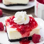 The absolute BEST white chocolate cheesecake bars with raspberry sauce. So creamy, not too sweet and with a delicious Oreo crust. 