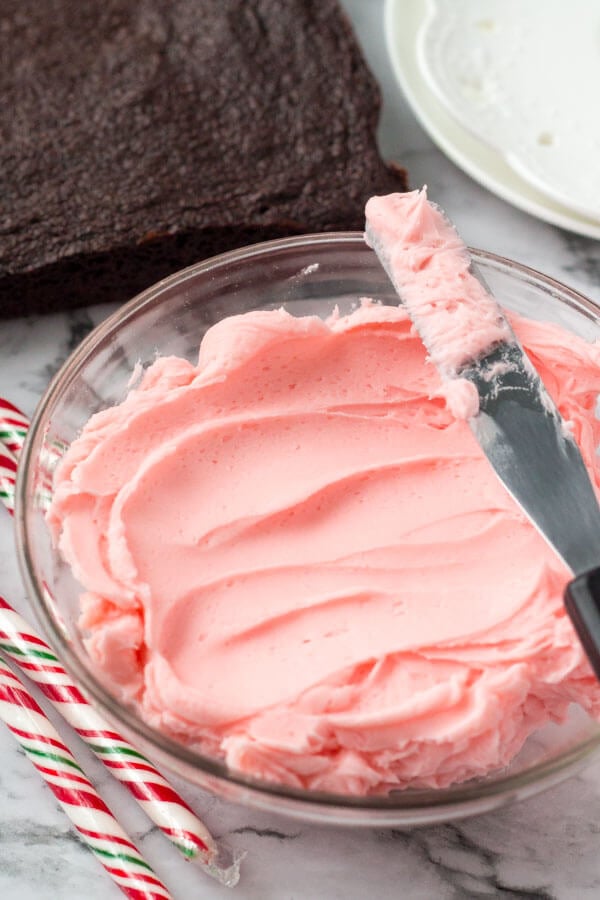 These candy cane brownies are the perfect Christmas brownies. They start with fudgy chewy brownies, then they're topped with a thick layer of creamy peppermint frosting and sprinkled with crushed candy canes. 