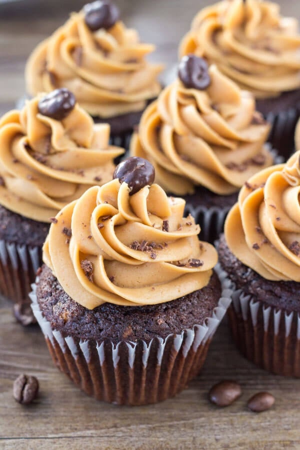 Moist, soft, fudgy chocolate cupcakes infused with coffee and topped with fluffy coffee frosting. These mocha cupcakes are perfect for true coffee lovers! 
