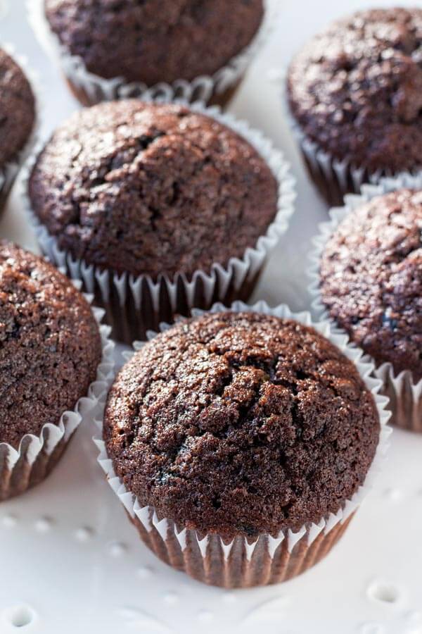 Moist, soft, fudgy chocolate cupcakes infused with coffee and topped with fluffy coffee frosting. These mocha cupcakes are perfect for true coffee lovers! 