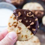 Soft, buttery, melt-in-your mouth sugar cookies with golden edges. Filled with toffee pieces & dipped in chocolate - these toffee icebox cookies are just that incredible. 