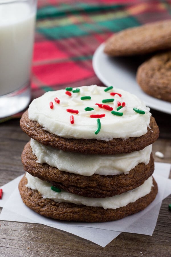 These easy gingerbread cookies are soft, chewy & perfect for the holidays. It's a no chill recipe - so they take way less time to make than regular gingerbread cookies. Then they're topped with fluffy cream cheese frosting. 