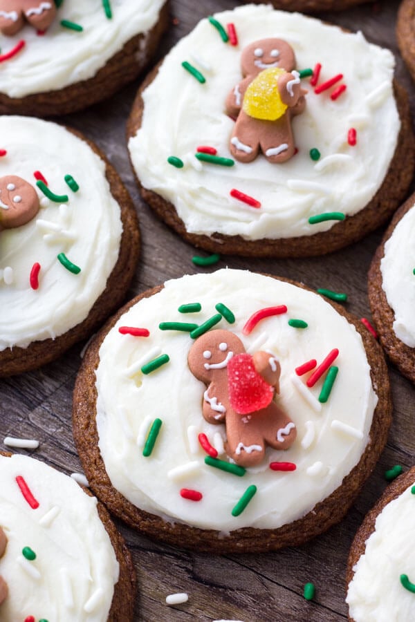 These easy gingerbread cookies are soft, chewy & perfect for the holidays. It's a no chill recipe - so they take way less time to make than regular gingerbread cookies. Then they're topped with fluffy cream cheese frosting. 
