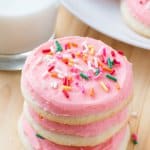 These copycat Lofthouse sugar cookies are soft, buttery and melt in your mouth. They have that same creamy frosting you love and are decorated with sprinkles. 