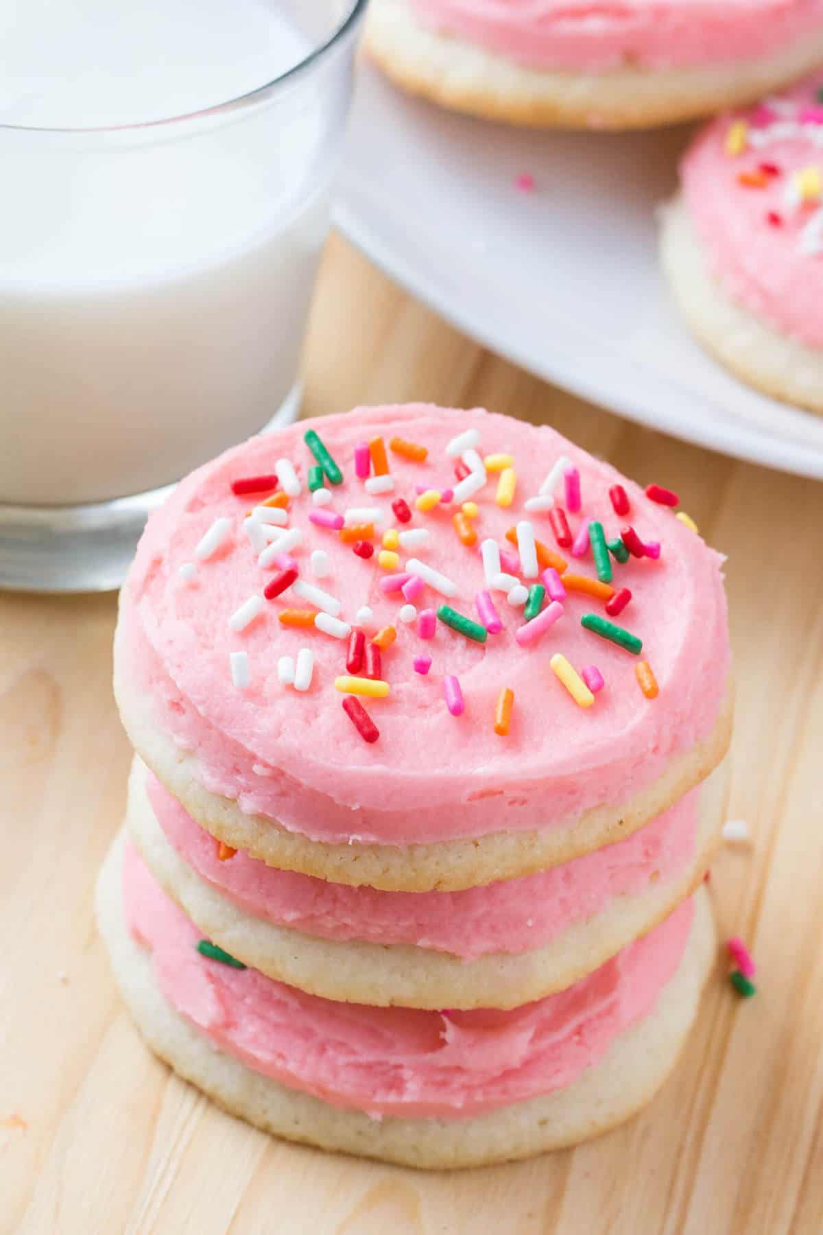These copycat Lofthouse sugar cookies are soft, buttery and melt in your mouth. They have that same creamy frosting you love and are decorated with sprinkles. 