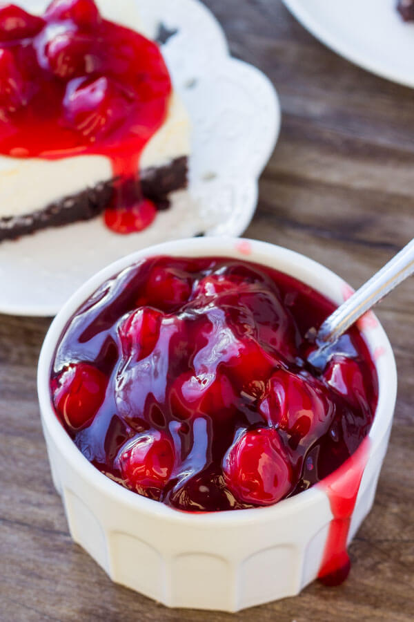 Top your cheesecake with cherry pie filling or fresh fruit. It tastes delicious and covers cheesecake cracks. 