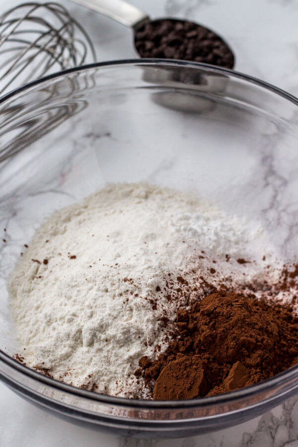 When making chocolate pancakes, first whisk together the dry ingredients. 