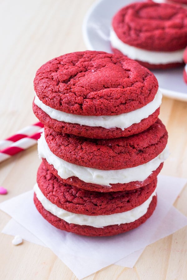 A stack of homemade red velvet oreos made from scratch.