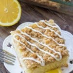 This lemon coffee cake starts with a delicious dense, moist lemon cake. Then topped with crumb topping and a lemon cream cheese glaze.