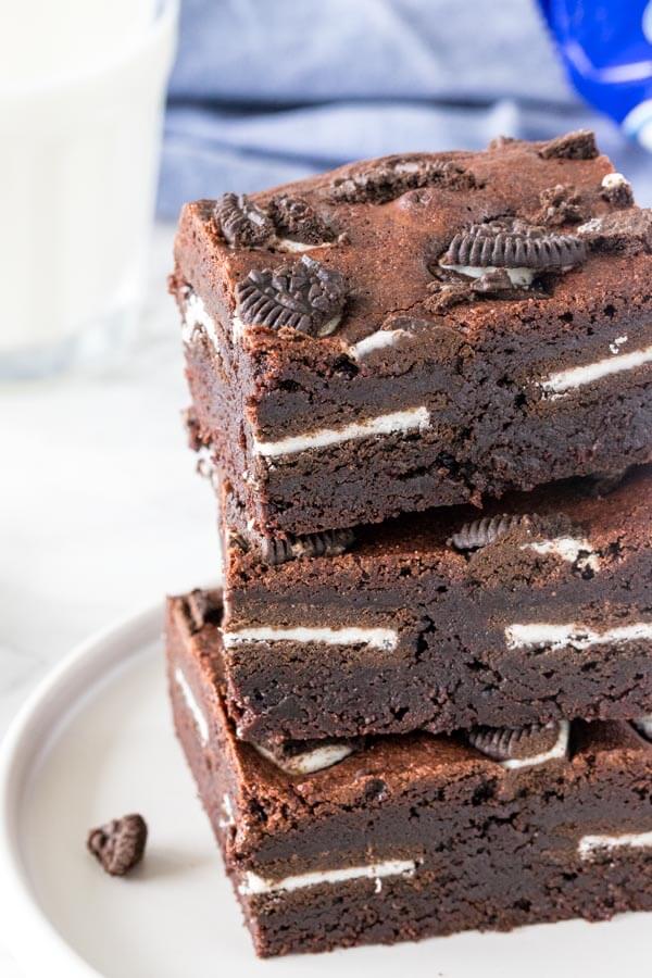A stack of 3 extra fudgy oreo brownies. 