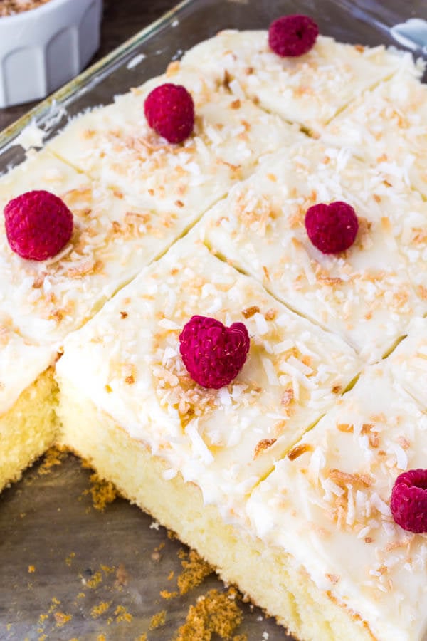 Homemade coconut cake with coconut frosting -moist, tender and filled with coconut. 