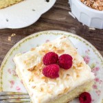 Homemade coconut cake is tender and moist with a delicious coconut flavor and fluffy coconut frosting
