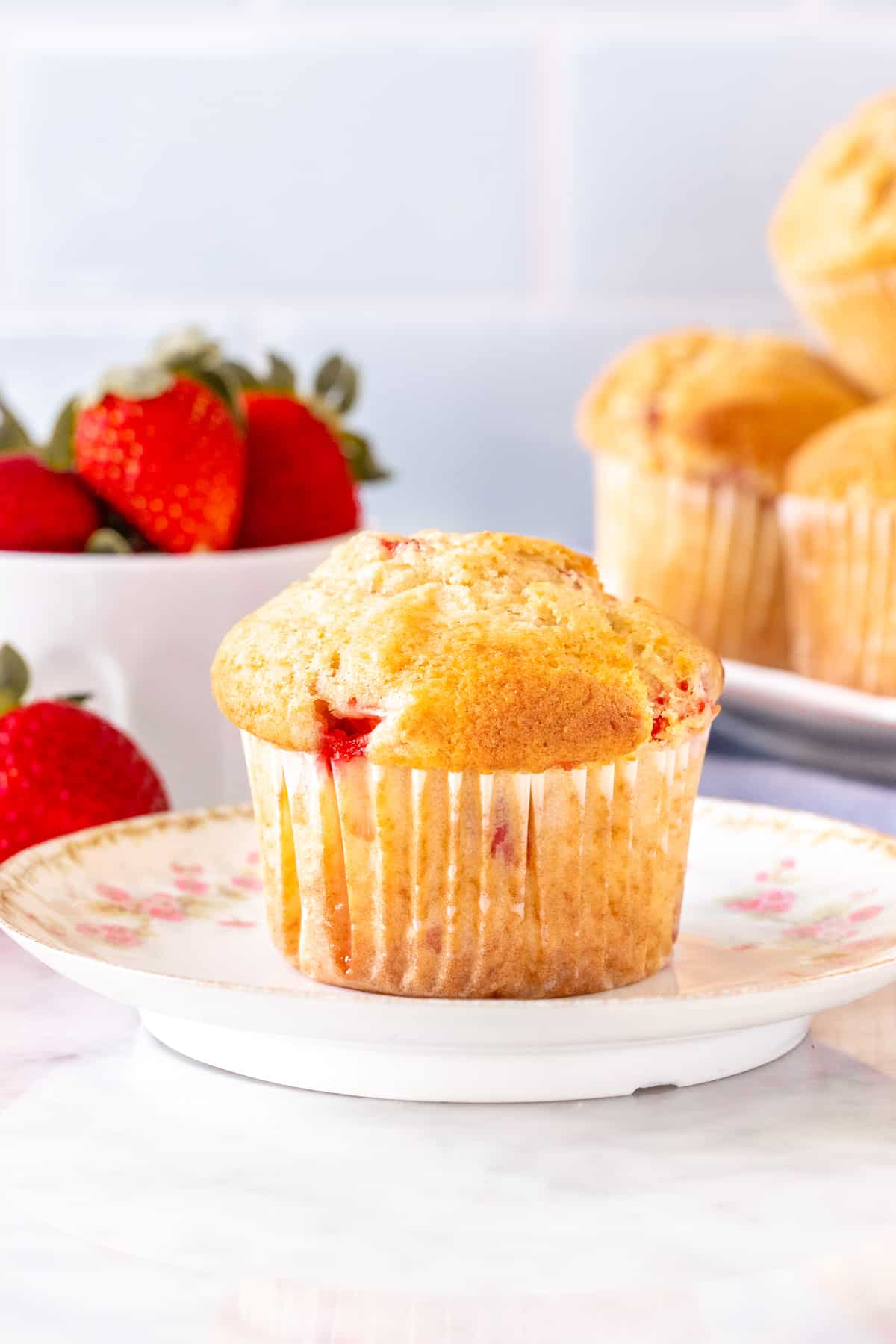 Strawberry muffin on plate