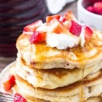 These strawberry pancakes are extra fluffy with golden edges and filled with juicy berries in every bite. They're a delicious, easy, breakfast recipe that comes together in no time.